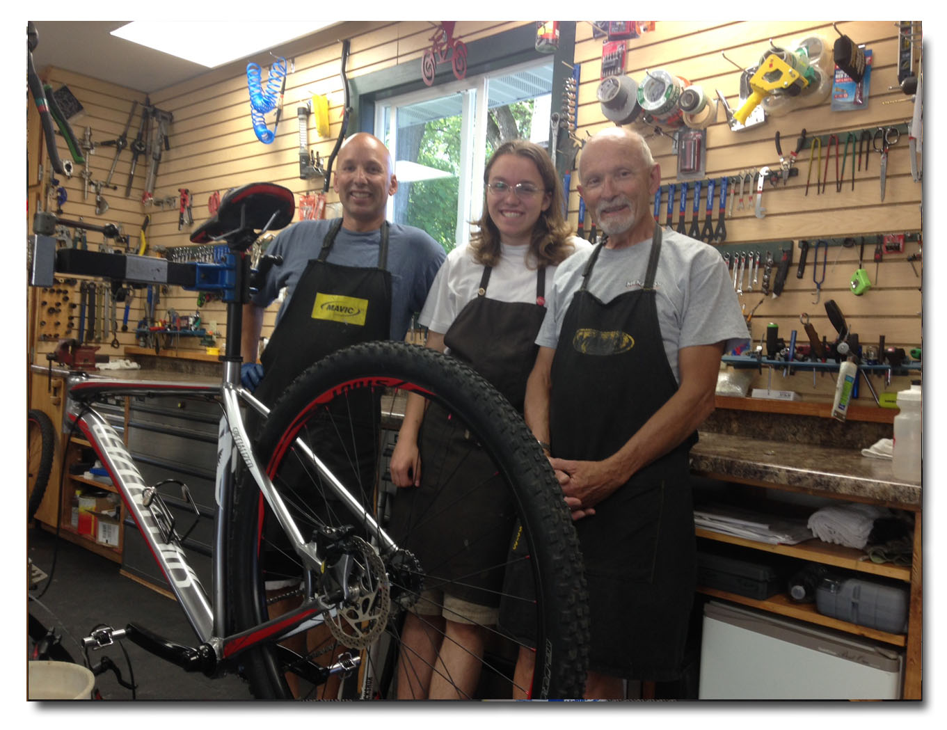 Tim and the Family at the affordablebikerepair shop